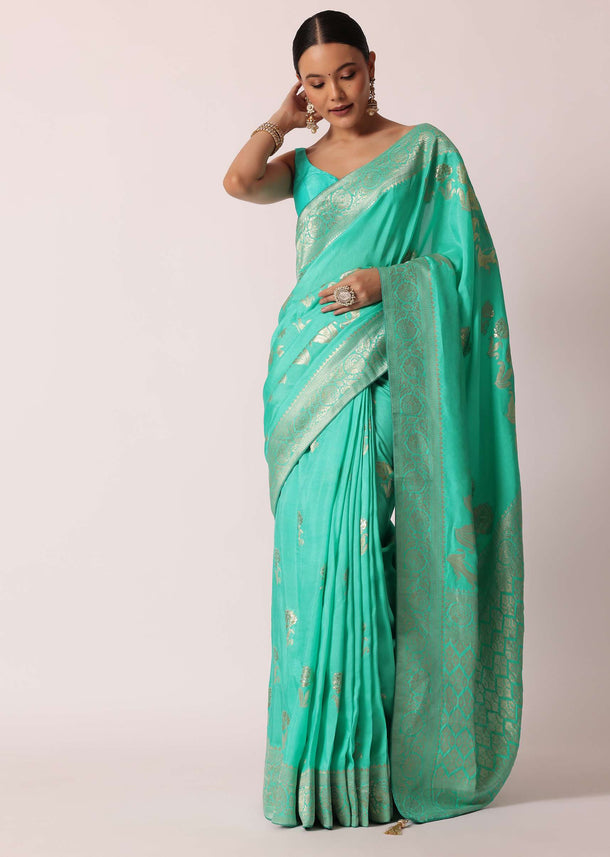 Turquoise Banarasi Saree With Floral Jaal Zari Pallu And Unstitched Blouse Piece