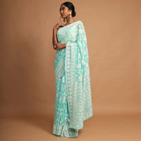 Turquoise Saree In Georgette With Lucknowi Thread Embroidered Floral Design