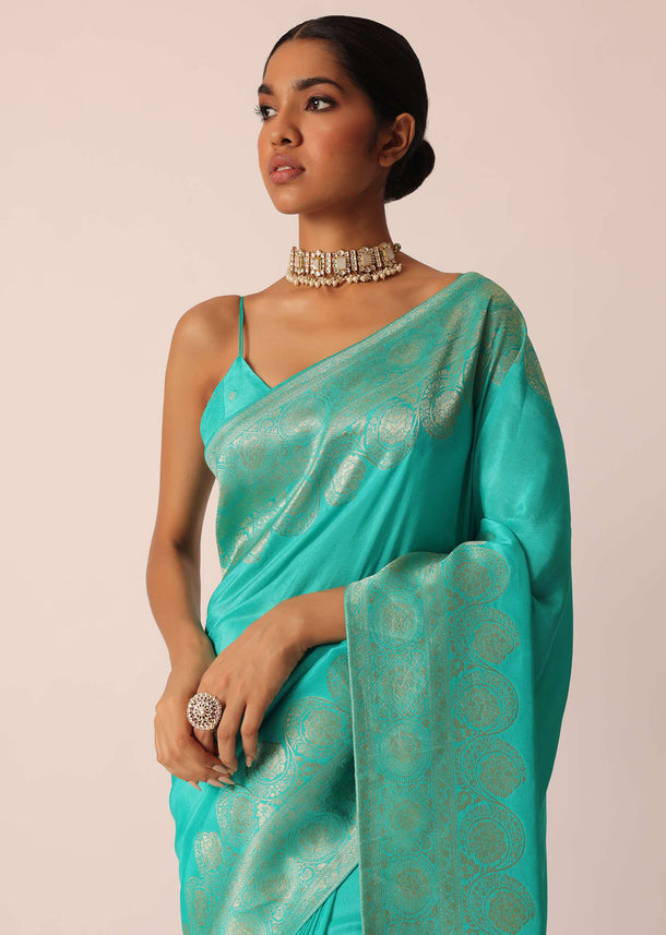 Turquoise Saree In Silk With Zari Work And Unstitched Blouse Piece