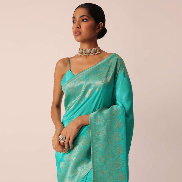 Turquoise Saree In Silk With Zari Work And Unstitched Blouse Piece