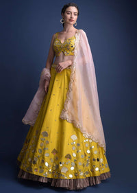 Sunset Yellow Lehenga Choli With Floral And Leaf Cut Mirror Work