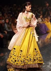 Sunset Yellow Lehenga Choli With Floral And Leaf Cut Mirror Work