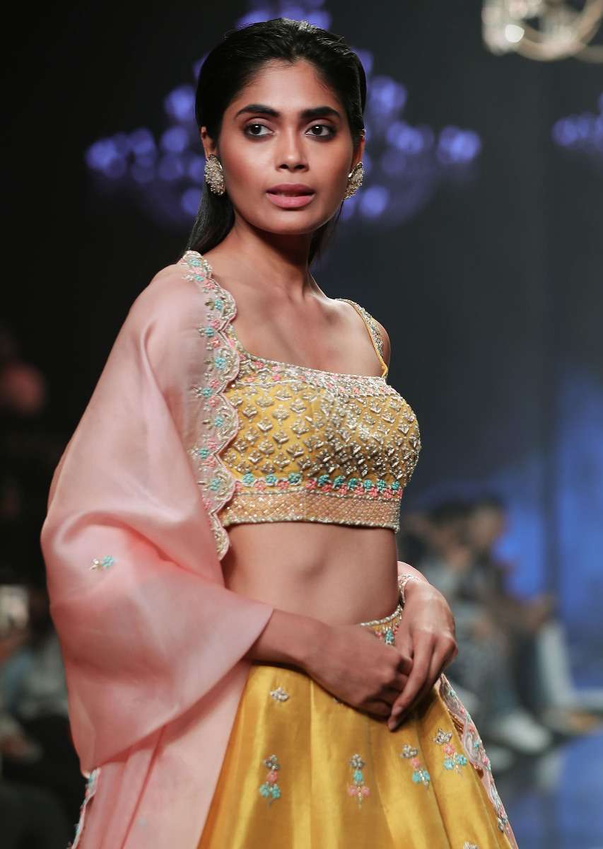 Sunset Yellow Lehenga Choli With Hand Embroidered Buttis