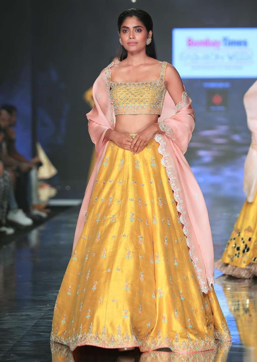 Sunset Yellow Lehenga Choli With Hand Embroidered Buttis