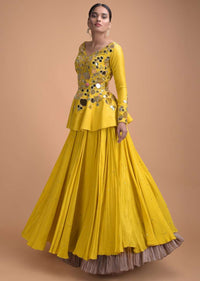 Sunset Yellow Peplum Top With Flower And Leaf Cut Mirror Work And Matching Lehenga