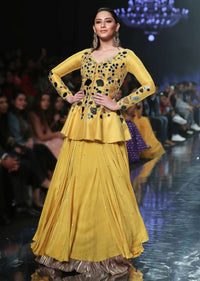 Sunset Yellow Peplum Top With Flower And Leaf Cut Mirror Work And Matching Lehenga