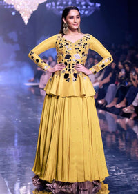 Sunset Yellow Peplum Top With Flower And Leaf Cut Mirror Work And Matching Lehenga