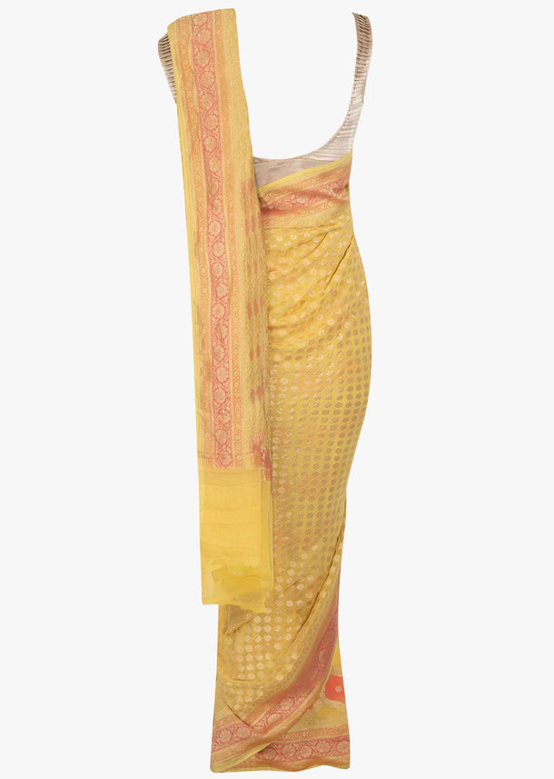 Tuscan sun yellow saree in geometric shapes highlighted in multiple colors