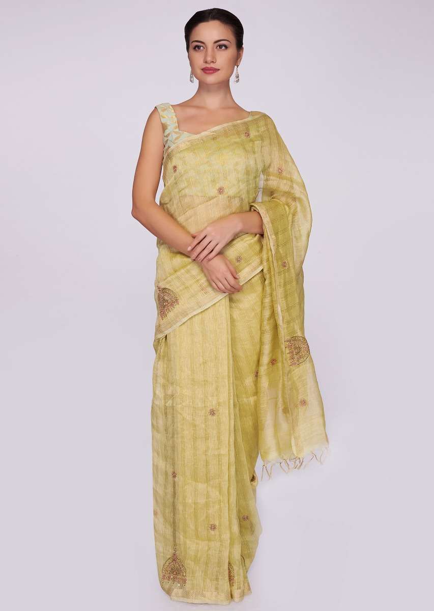 Tussar silk beige saree in embroidered butti 