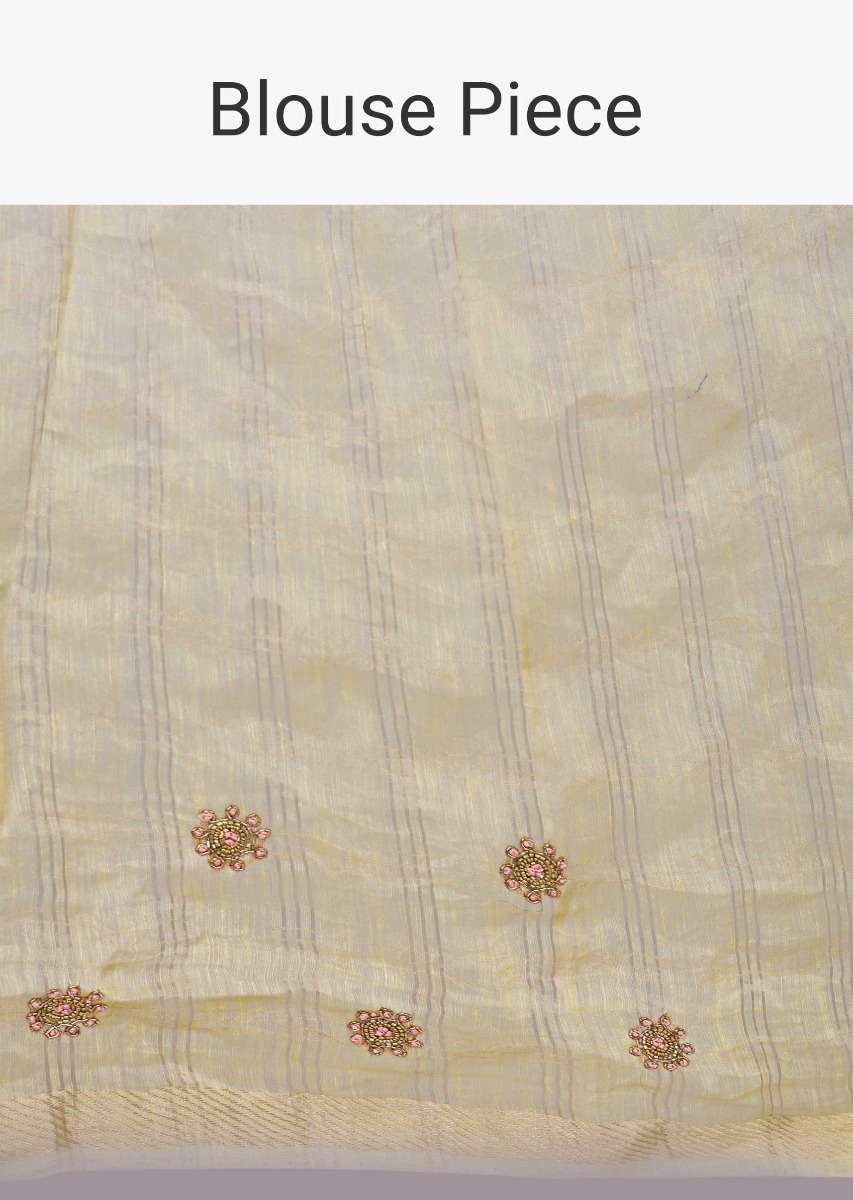 Tussar silk beige saree in embroidered butti 