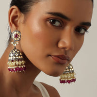 Two Tone Kundan Jhumkas With Embedded Tiered Red Beads