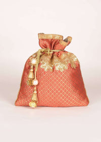 Vermillion And Gold Potli Bag In Brocade With Geometric Motif Online - Kalki Fashion