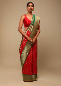 Vermillion Red Saree In Art Handloom Silk With Green Woven Border And Two Toned Buttis Along With Unstitched Blouse