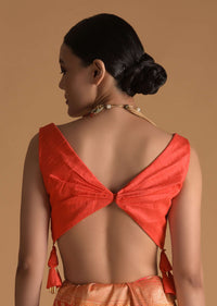 Vermillion Orange Blouse In Raw Silk With Pleat Details On The Front And Back Along With Tassels On The Sides