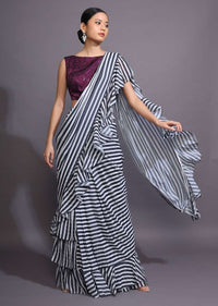 White And Black Ruffle Saree With Striped Print Online - Kalki Fashion