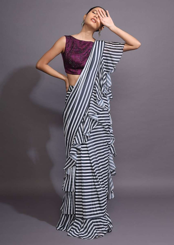 White And Black Ruffle Saree With Striped Print Online - Kalki Fashion