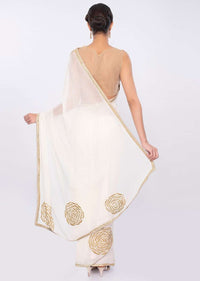 White chiffon saree with cut dana embroidery and butti only on Kalki