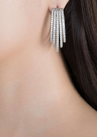 White Finish Earrings In An Edgy Design Studded With Faux Diamonds By Aster