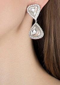 White Finish Earrings Studded With Kundan And Faux Diamonds In Drop Design By Aster