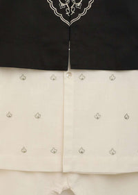 Kalki Boys White Kurta Set With Embroidered Buttis And Black Nehru Jacket With Ornate Embroidered Motif By Tiber Taber