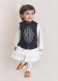 Kalki Boys White Kurta Set With Embroidered Buttis And Black Nehru Jacket With Ornate Embroidered Motif By Tiber Taber