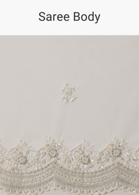 White Net Saree With All Over Embroidery