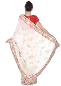 White saree in floral motif embroidery in sequin only on Kalki