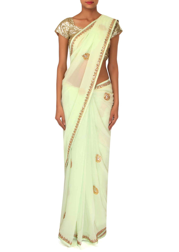 White saree adorn in gotta patti and zari butti only on Kalki