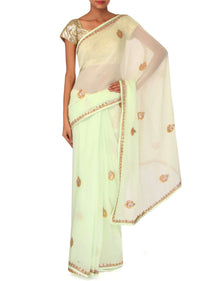 White saree adorn in gotta patti and zari butti only on Kalki