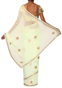 White saree adorn in gotta patti and zari butti only on Kalki