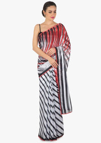 White and black stripe print with black kundan along the border only on  Kalki