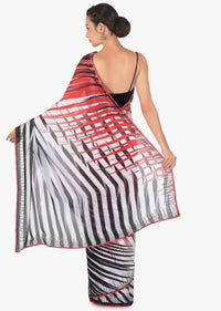 White and black stripe print with black kundan along the border only on  Kalki