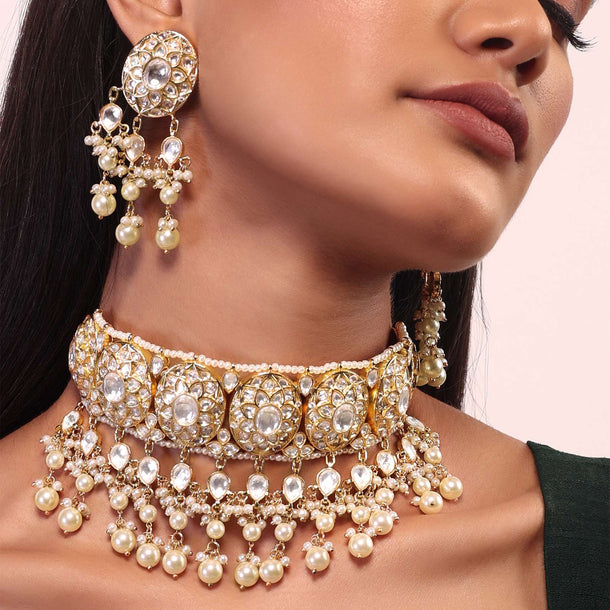 Gold Plated Choker Set With Kundan Work In Floral Design With Dangling Pearl Fringes