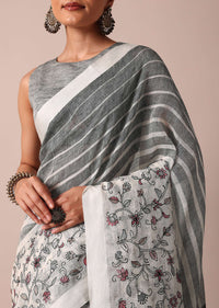 White Cotton Linen Floral Thread Embroidered Saree With Unstitched Blouse Piece