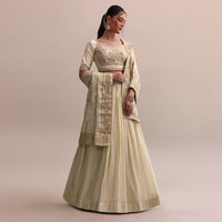 White Hand Work Embroidered Silk Choli With Lehenga And Heavy Dupatta