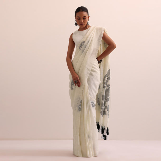 White Linen Saree In Abstract Thread Work And Unstitched Blouse