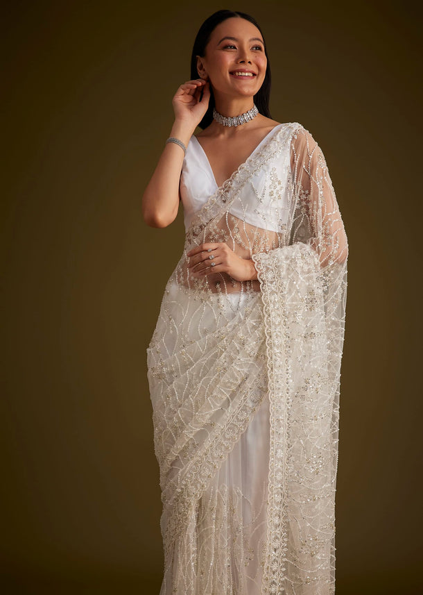 White Net Saree With Sequins And Stones Embroidery