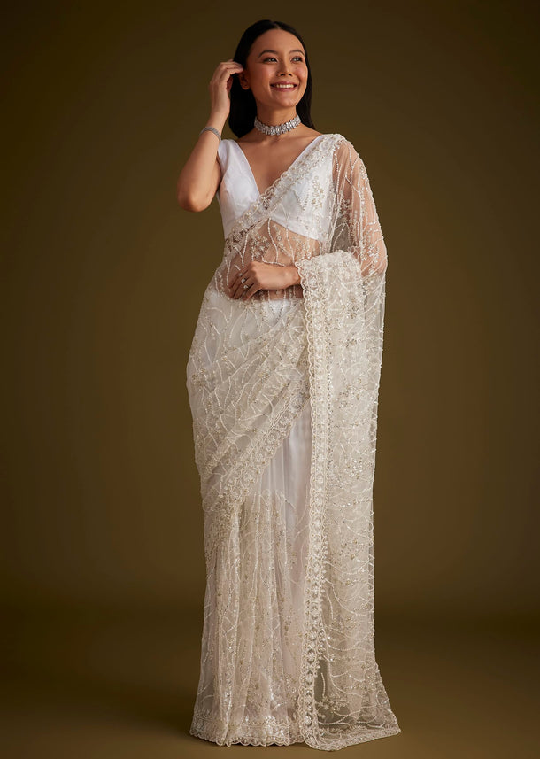White Net Saree With Sequins And Stones Embroidery