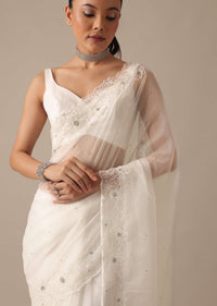 White Organza Saree With Cutdana Work And Unstitched Blouse Piece