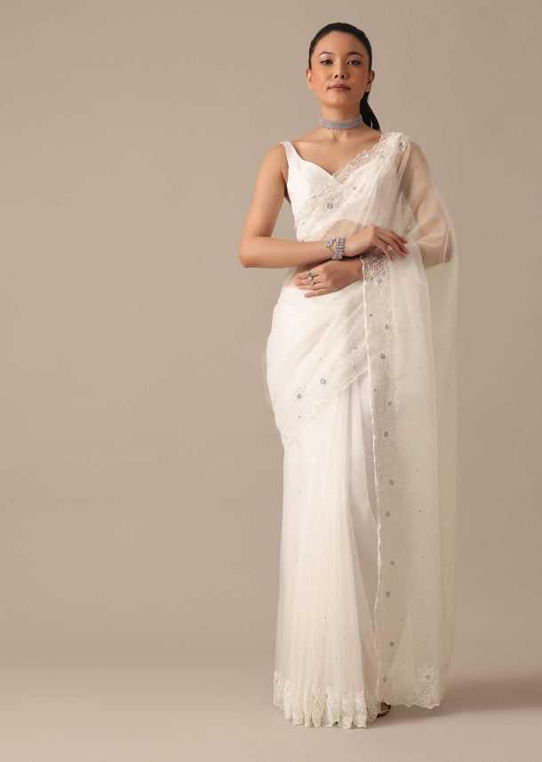 White Organza Saree With Cutdana Work And Unstitched Blouse Piece