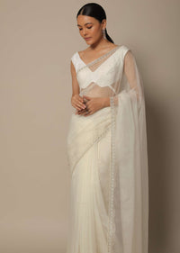 White Organza Saree With Scallop Cutdana Border And Unstitched Blouse Piece