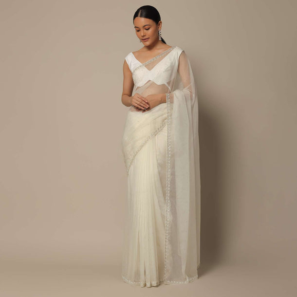 White Organza Saree With Scallop Cutdana Border And Unstitched Blouse Piece