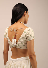 White Padded Blouse With Golden zardosi Border And Thread Work In Green