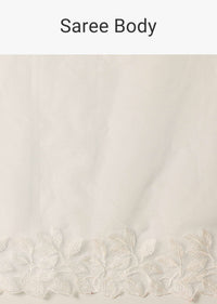White Saree In Organza With Floral Motif Border And Unstitched Blouse Piece
