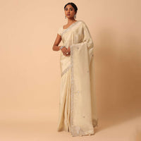 White Saree In Tissue Silk With Gota Patti Work And Unstitched Blouse Piece