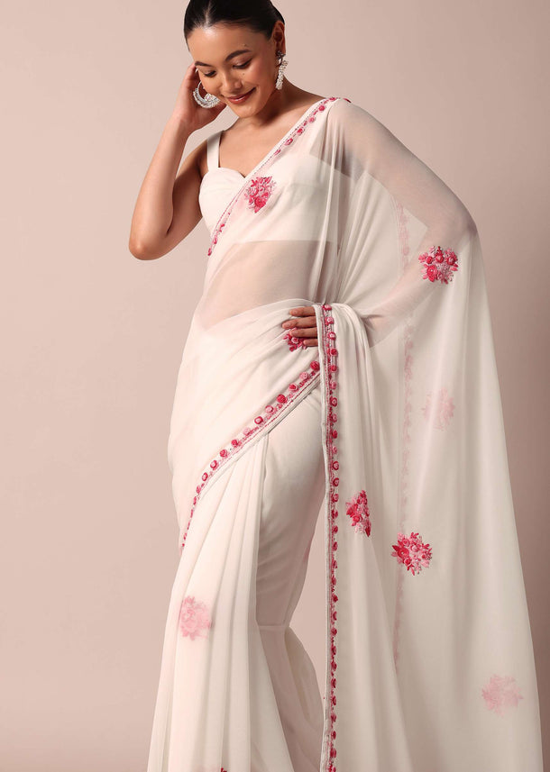 White Saree With Floral Embroidery And Unstitched Blouse Piece