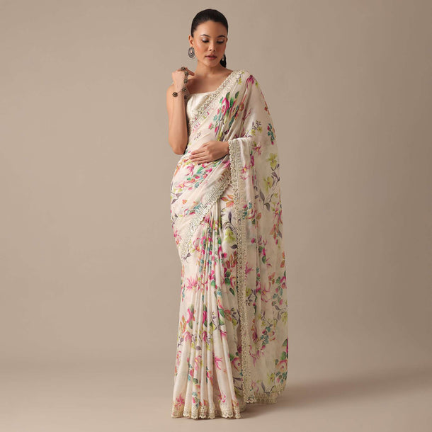 White Saree With Floral Prints And Unstitched Blouse Piece