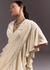 White Satin Frill Style Saree With Sleeveless Blouse