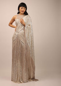 White Sequins Saree With A Fringe Border And Blouse With A Fancy Neckline