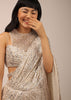 White Sequins Saree With A Fringe Border And Blouse With A Fancy Neckline